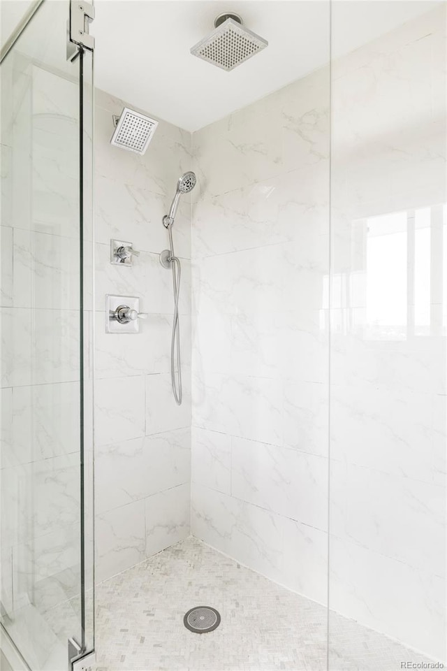 full bathroom with a stall shower