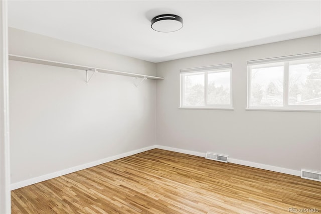 spacious closet with visible vents and light wood finished floors