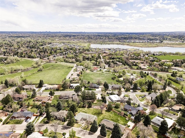 aerial view featuring a water view and a residential view