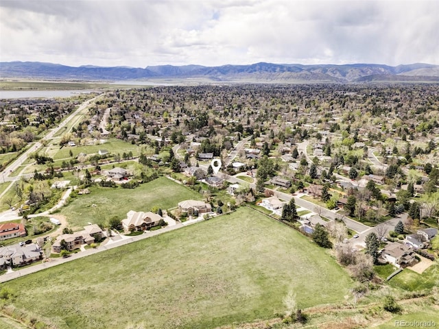 drone / aerial view with a residential view and a mountain view