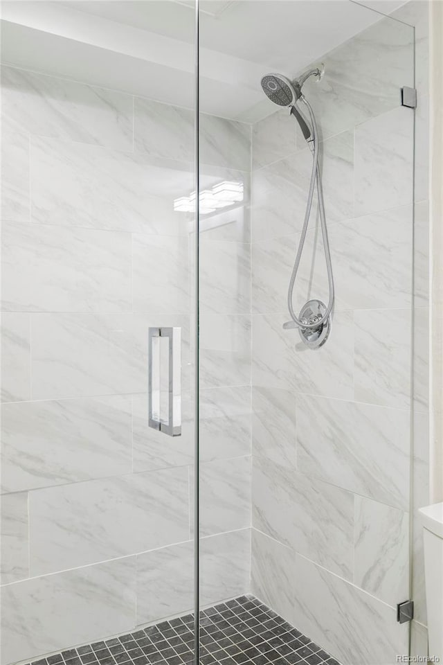 bathroom with a stall shower
