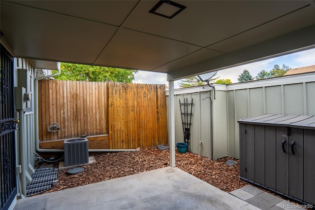 view of patio with central AC unit