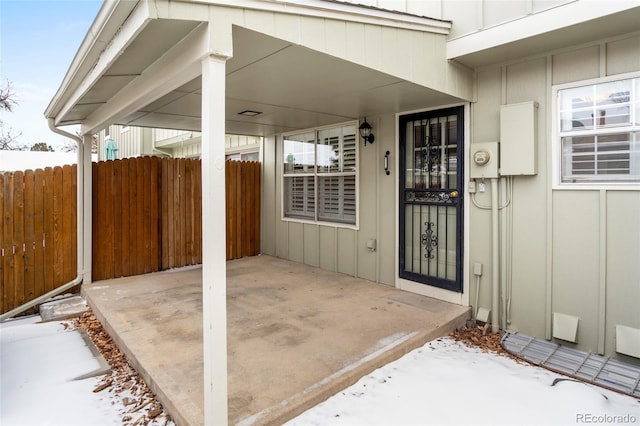 doorway to property with a patio