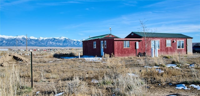 exterior space featuring a mountain view