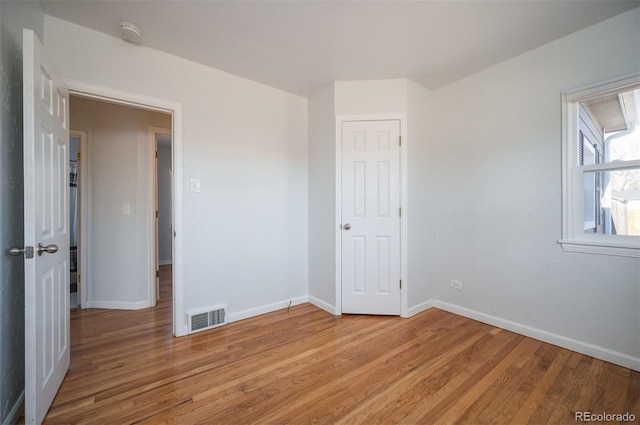 unfurnished bedroom with light hardwood / wood-style floors