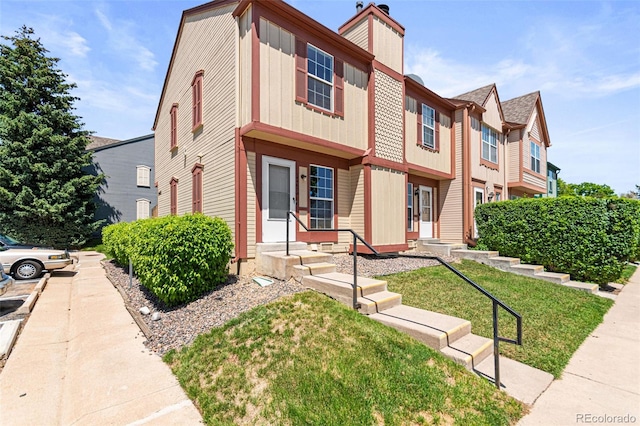 14465 E Hawaii Cir Unit A, Aurora, CO 80012 - multi unit property featuring a front lawn and entry steps