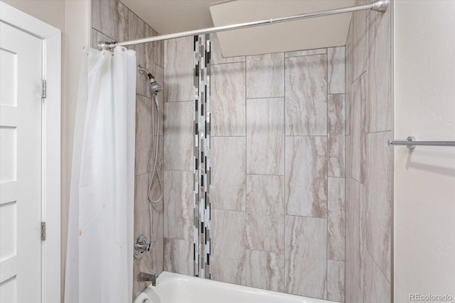 bathroom with shower / bathtub combination with curtain