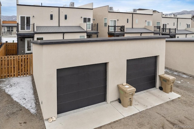 garage featuring fence