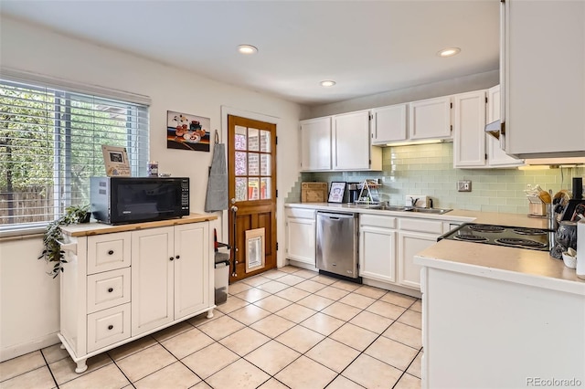 5184 E Asbury Ave, Denver, CO 80222 - kitchen featuring dishwasher, black microwave, plenty of natural light, white cabinets, and recessed lighting