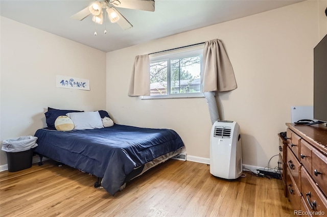 5184 E Asbury Ave, Denver, CO 80222 - bedroom featuring light wood-style flooring, baseboards, and a ceiling fan