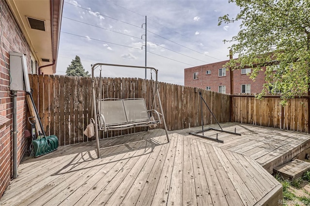 5184 E Asbury Ave, Denver, CO 80222 - wooden deck featuring a fenced backyard
