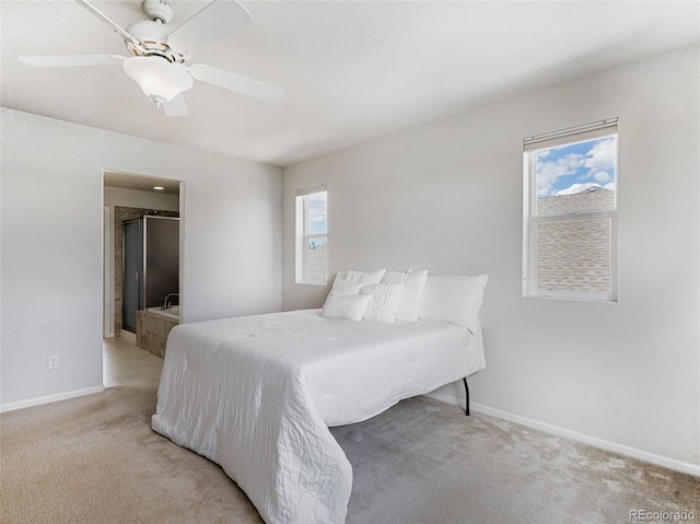 bedroom featuring light colored carpet and ceiling fan