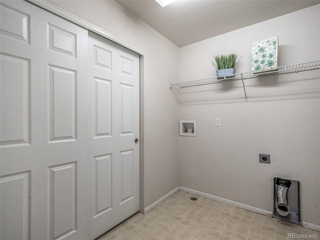 laundry room with hookup for a washing machine and hookup for an electric dryer