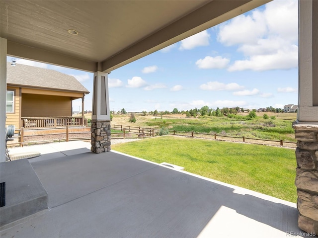 view of patio with a rural view