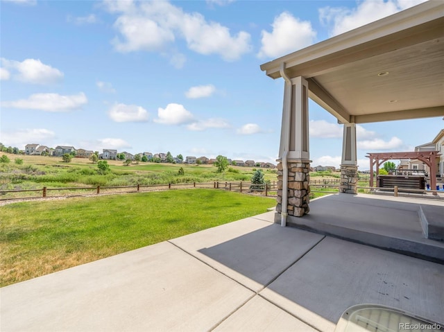 view of patio / terrace with a rural view