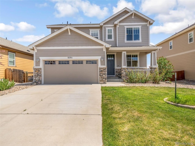 craftsman-style home with a porch, a garage, and a front lawn