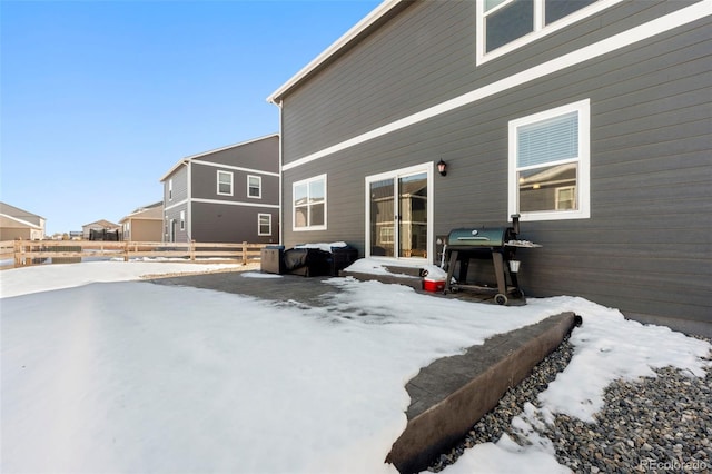 view of snow covered house