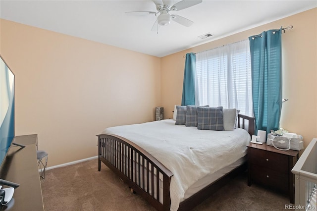 bedroom featuring ceiling fan and light colored carpet