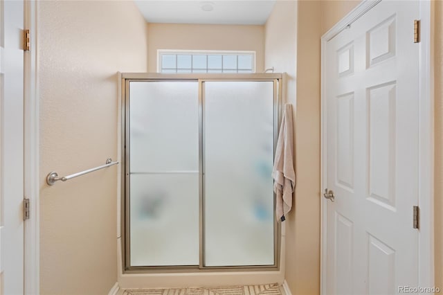 bathroom with an enclosed shower