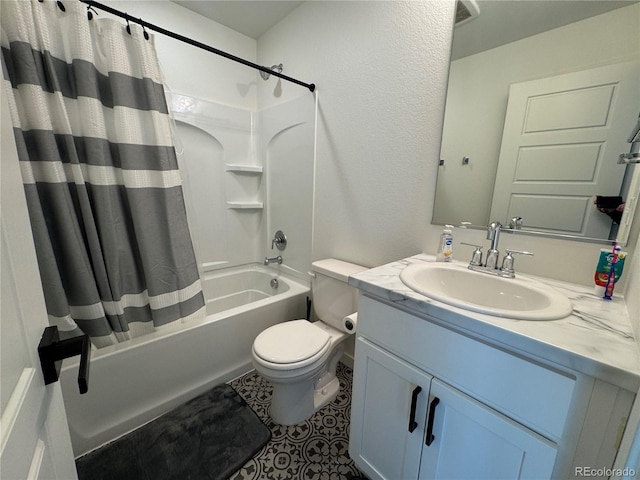 full bathroom featuring tile patterned flooring, vanity, shower / tub combo with curtain, and toilet