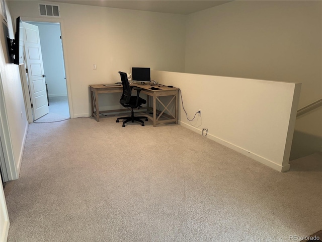 office area with light colored carpet