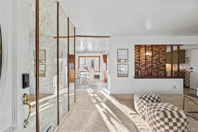 hallway featuring carpet flooring