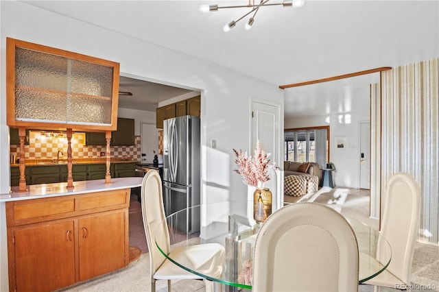 dining space with light carpet