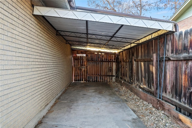 garage featuring a carport