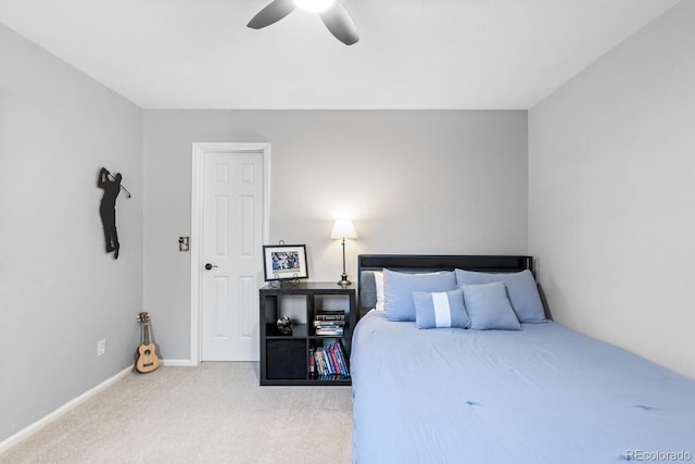 bedroom with ceiling fan and carpet