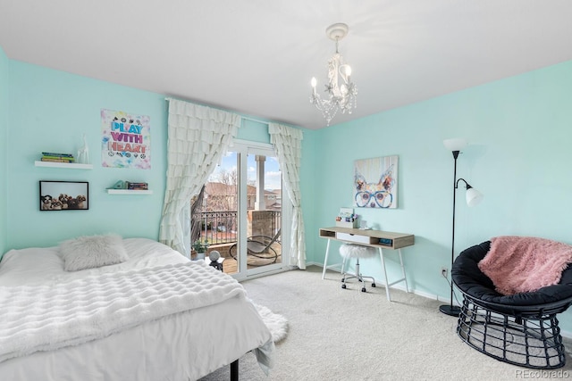 bedroom with a notable chandelier, access to outside, and carpet