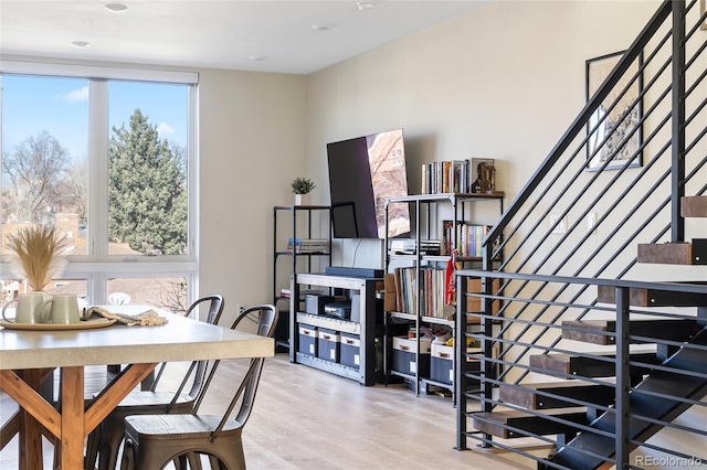 5125 W 29th Ave Unit 5, Denver, CO 80212 - dining space featuring wood finished floors and stairway