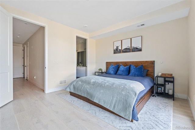 5125 W 29th Ave Unit 5, Denver, CO 80212 - bedroom featuring light wood finished floors and baseboards