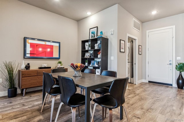 dining area featuring hardwood / wood-style flooring