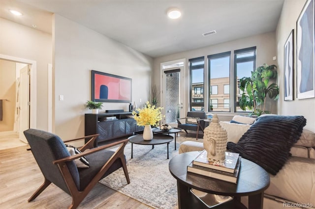 living room featuring light wood-type flooring