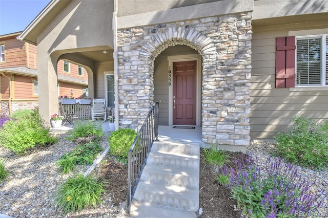 10550 Ashfield St, Highlands Ranch, CO 80126 - entrance to property with stone siding and stucco siding