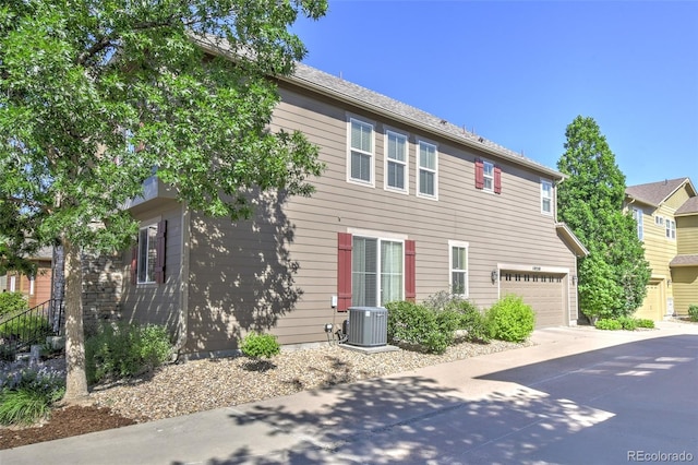 10550 Ashfield St, Highlands Ranch, CO 80126 - view of front of home with driveway and an attached garage