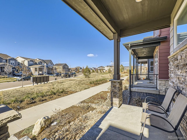 view of patio featuring a porch