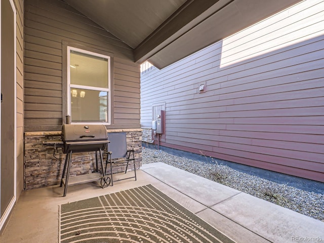 view of patio with a grill