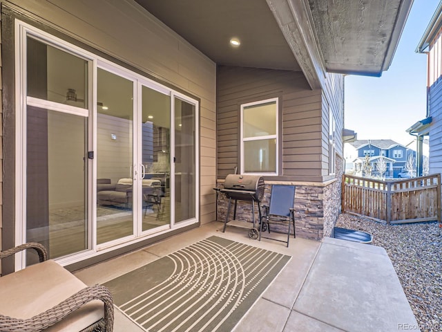 view of patio with a grill