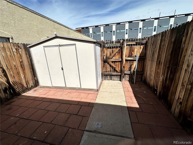 3081 W 18th Ave, Denver, CO 80204 - view of patio / terrace with a gate and a shed