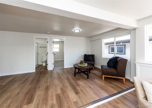 735 Valley Rd, Colorado Springs, CO 80904 - sitting room with baseboards and wood finished floors