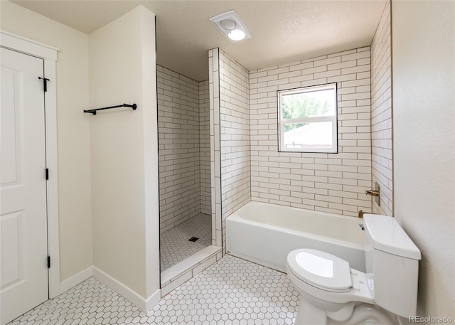 735 Valley Rd, Colorado Springs, CO 80904 - bathroom featuring toilet, a tile shower, tile patterned floors, and baseboards