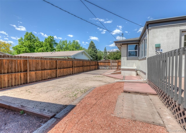 735 Valley Rd, Colorado Springs, CO 80904 - fenced backyard with a patio