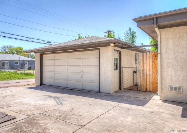 735 Valley Rd, Colorado Springs, CO 80904 - detached garage featuring a gate