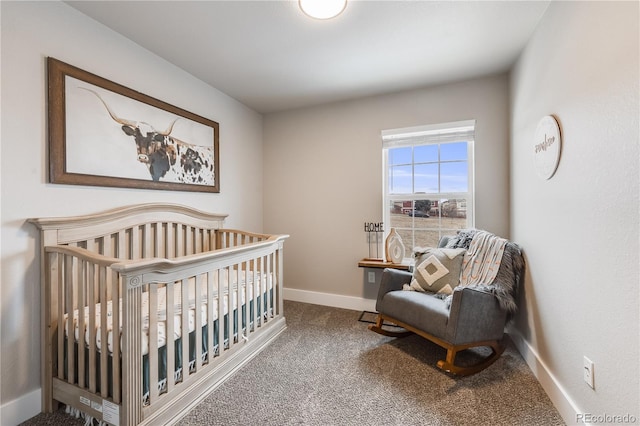 bedroom featuring carpet flooring and baseboards