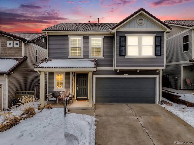 view of front of house with a garage