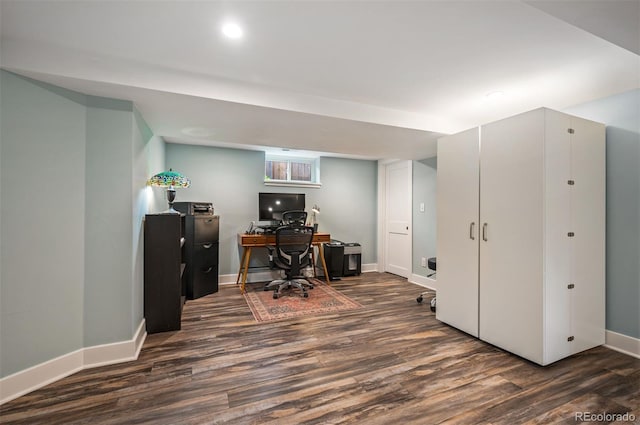 office featuring dark wood-type flooring and baseboards