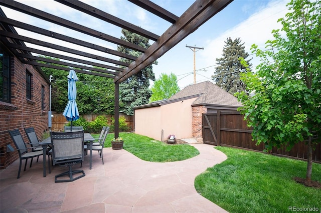 view of patio / terrace featuring a pergola and outdoor dining area
