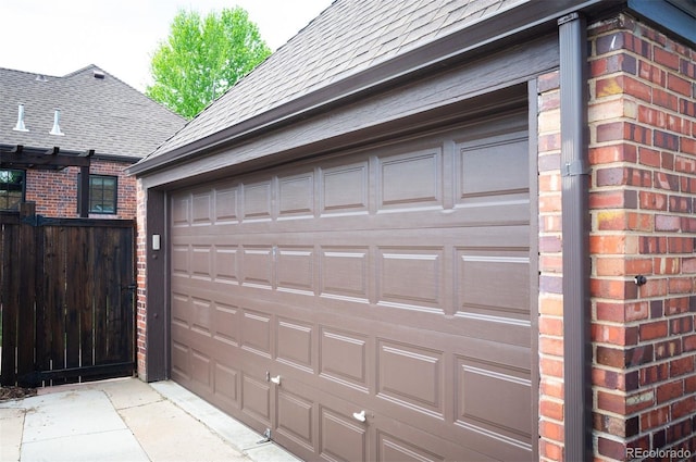 garage with fence