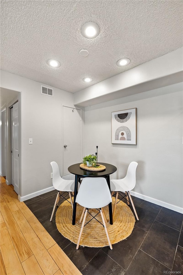 13404 E Jewell Ave Unit 101, Aurora, CO 80012 - dining area with a textured ceiling and recessed lighting